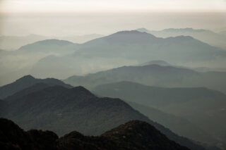 Endless Himalayan ridgelines stretching into the distance at sunset during the Mardi Himal Base Camp trek on the Fishtail Mountain Trek with Life Happens Outdoors