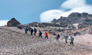 The Life Happens Outdoors team moving from Camp 1, Plaza Canadá, to Camp 2, Nido de Cóndores, during the Aconcagua Expedition.