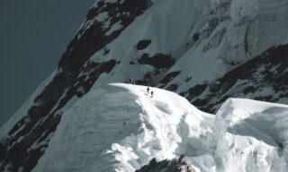 Life Happens Outdoors team members accessing Camp 3 on the way up to the summit from Camp 2 during the Climb Ama Dablam Expedition.