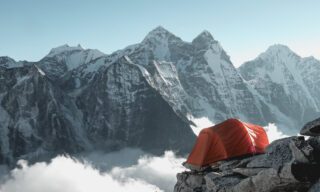 A tent on the edge of Camp 2 during the Climb Ama Dablam Expedition with the Life Happens Outdoors team.