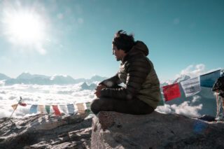 LHO Team Leader Rami Rasamny watching the view from Camp 2 during the Climb Ama Dablam Expedition with the Life Happens Outdoors team.