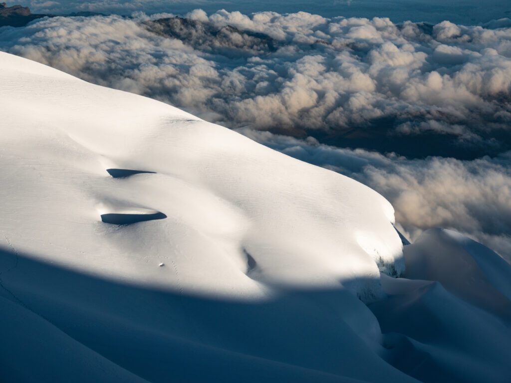The glacier of the Chimborazo Plateau between the main summit and the Ventimilla summit during the Climb Cotopaxi & Climb Chimborazo Expedition with the Life Happens Outdoors team.