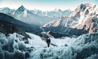 LHO climber Melissa Jefferies ascending the first set of fixed ropes on the glacier, surrounded by ice pinnacles formed by wind and dry conditions during the Lobuche East climb expedition.