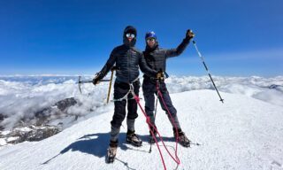 LHO team standing on the summit of Mount Kazbek, enjoying incredible sunshine and clear weather