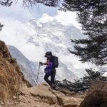A Life Happens Outdoors team member trekking on the Everest Base Camp Trek