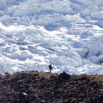 A Life Happens Outdoors hiker in front of a beautiful glacier during the Everest Base Camp Trek
