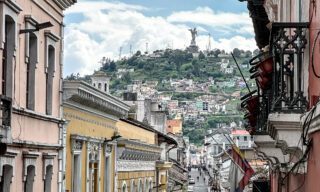 LHO adventurers exploring Quito’s historic Old Town, walking past colonial architecture, vibrant plazas, and centuries-old churches.