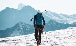 IFMGA guide Gregoire Sauget leading the team on the Trient Glacier on the second day of the Chamonix to Zermatt Haute Route Expedition with the Life Happens Outdoors team.