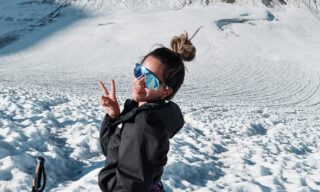 LHOer soaking up the sun on the glacier during the Chamonix to Zermatt Haute Route Expedition with the Life Happens Outdoors team.