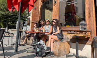 The Life Happens Outdoors team enjoying the summer sun in Chamonix town center during the Chamonix Valley Treks, the Best Day Hikes Around Mont Blanc.