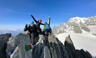 The summit of Aiguille Marbrées during the Mont Blanc Summit Climb course with the Life Happens Outdoors team.