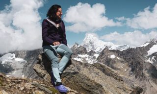LHOer Ray Yafi enjoying the incredible view above Cabane des Vignettes with the Dent Blanche in the background during the Chamonix to Zermatt Haute Route Expedition with the Life Happens Outdoors team.