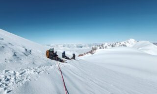 LHO team taking a break just below the summit ridge of Mount Kazbek under incredible weather conditions