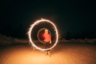 LHO team playing with light captures on the snowy beach at Senja Island while waiting for the northern lights in Norway to appear.