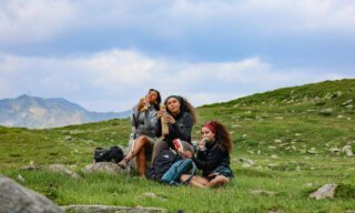 Enjoying a picnic at Col des Possettes above the Chamonix Valley during the Chamonix Valley Treks, the Best Day Hikes Around Mont Blanc with the Life Happens Outdoors team.