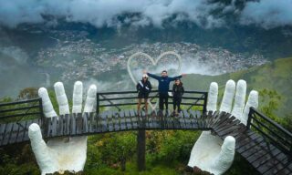 LHO adventurers at the Tungurahua viewpoint above Baños, surrounded by sweeping views of the cloud forest and volcanic landscapes.