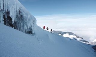Anthony Mezher and Jean Louis Moukarzel moments before the summit of Cotopaxi with LHO guide Franklin Varela during the Climb Cotopaxi & Climb Chimborazo Expedition with the Life Happens Outdoors team.