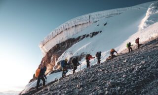 The Life Happens Outdoors team on the shoulder beneath the crater rim of Cotopaxi during the Climb Cotopaxi & Climb Chimborazo Expedition.