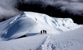 Descending the shoulder of Cotopaxi beneath the crater during the Climb Cotopaxi & Climb Chimborazo Expedition with the Life Happens Outdoors team.