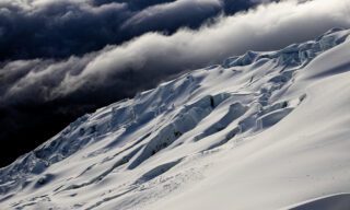 The Cotopaxi Glacier as seen from the shoulder on the way down during the Climb Cotopaxi & Climb Chimborazo Expedition with the Life Happens Outdoors team.