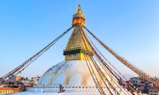 View of Boudhanath Stupa during the city tour on arrival day with Life Happens Outdoors on a Nepal adventure tour