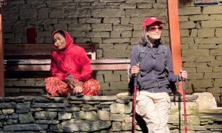 Life Happens Outdoors adventurer posing with a local woman during the trekking portion of a Nepal adventure travel experience