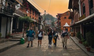 Life Happens Outdoors adventurers walking through the heritage streets of Bandipur on a Nepal adventure travel experience