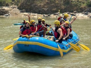 Life Happens Outdoors adventurers rafting on the first day of their Nepal adventure trip