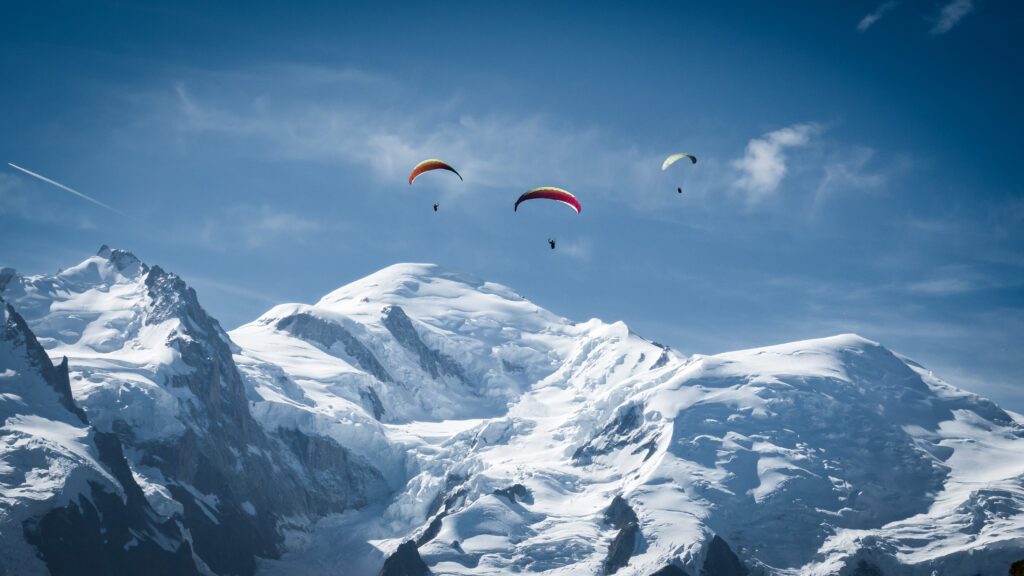 Paragliding above the Mont Blanc Massif and the Chamonix Valley during the Ultimate Alpine Adventure Holiday with the Life Happens Outdoors team.