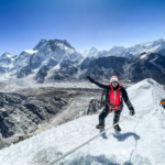 LHOer Melissa Jeffries on the summit during the Climb Lobuche East Expedition with the Life Happens Outdoors team.