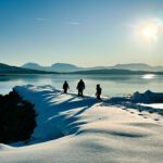 The Doughan family exploring the fjords on the Arctic island of Senja during the Family Adventures: Chase the Northern Lights with the Life Happens Outdoors team.