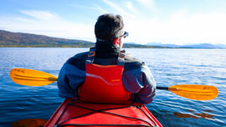 LHO team kayaking on the fjords off the coast of Senja during the Norway Arctic adventure