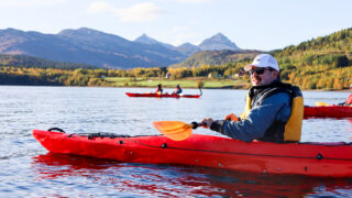 LHO team kayaking on the fjords off the coast of Senja during the Norway Arctic adventure