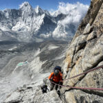 Tony Aoun crossing the Yellow Tower on the way to Camp 2 during the Climb Ama Dablam Expedition with the Life Happens Outdoors team.