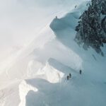 Ascending the moguls on the way to the summit ridge during the Mont Blanc Summit Climb course with the Life Happens Outdoors team.