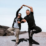 Life Happens Outdoors climbers on Kilimanjaro’s Machame Route celebrating the successful ascent of the Barranco Wall.