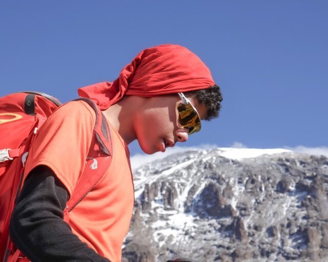 Climbing Kilimanjaro during the Kilimanjaro Family Adventure with the Life Happens Outdoors team.