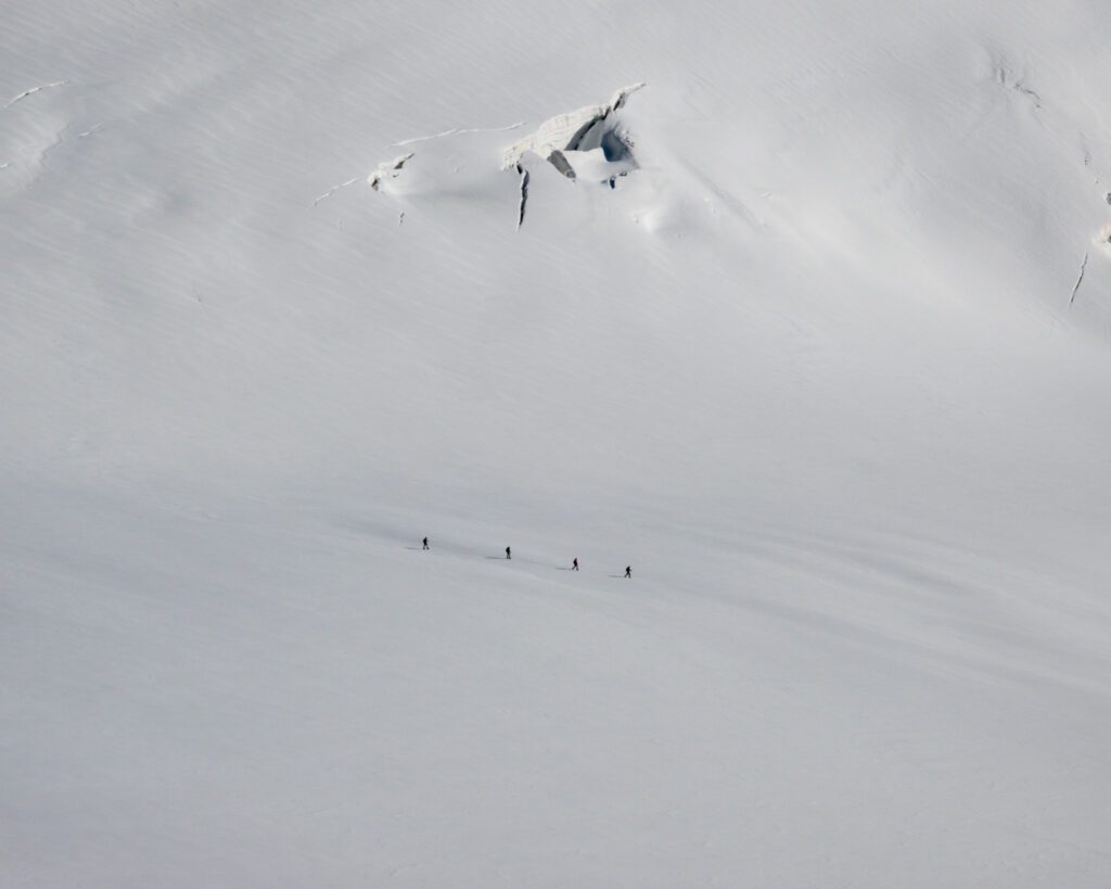 The Life Happens Outdoors team crossing the Vallée Blanche during the Mont Blanc Summit Climb course.