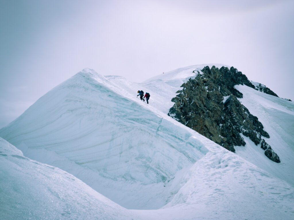 The Life Happens Outdoors team crossing the Vallée Blanche during the Mont Blanc Summit Climb course.
