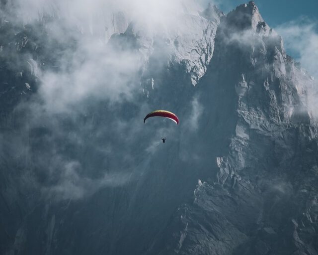 Paragliding next to Mont Blanc during the Ultimate Alpine Family Adventure with the Life Happens Outdoors team.