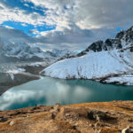The Gokyo Lakes with the Gokyo Valley in the background as the Life Happens Outdoors team descends from Gokyo Ri during the Gokyo Lakes Trek, one of the best treks for views of Mount Everest.