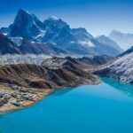 The Gokyo Lakes, Gokyo Village, and Gokyo Valley as seen just after sunrise from the top of Gokyo Ri, with a beautiful view of Cholatse during the Gokyo Lakes Trek with the Life Happens Outdoors team.