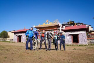 The Life Happens Outdoors team in front of the Tengboche Monastery on the Everest Base Camp Trek before heading up to Dingboche.