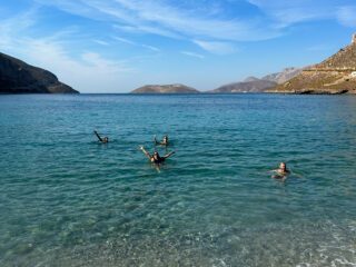 The Life Happens Outdoors team enjoying a break in the sea during the Rock Climbing in Kalymnos adventure.