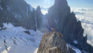 LHO Founder and Team Leader Rami Rasamny climbing with LHO IFMGA guide Gregoire Sauget on the Pointe Inominata as they scout new course options for the Eiger Course with the Life Happens Outdoors team.