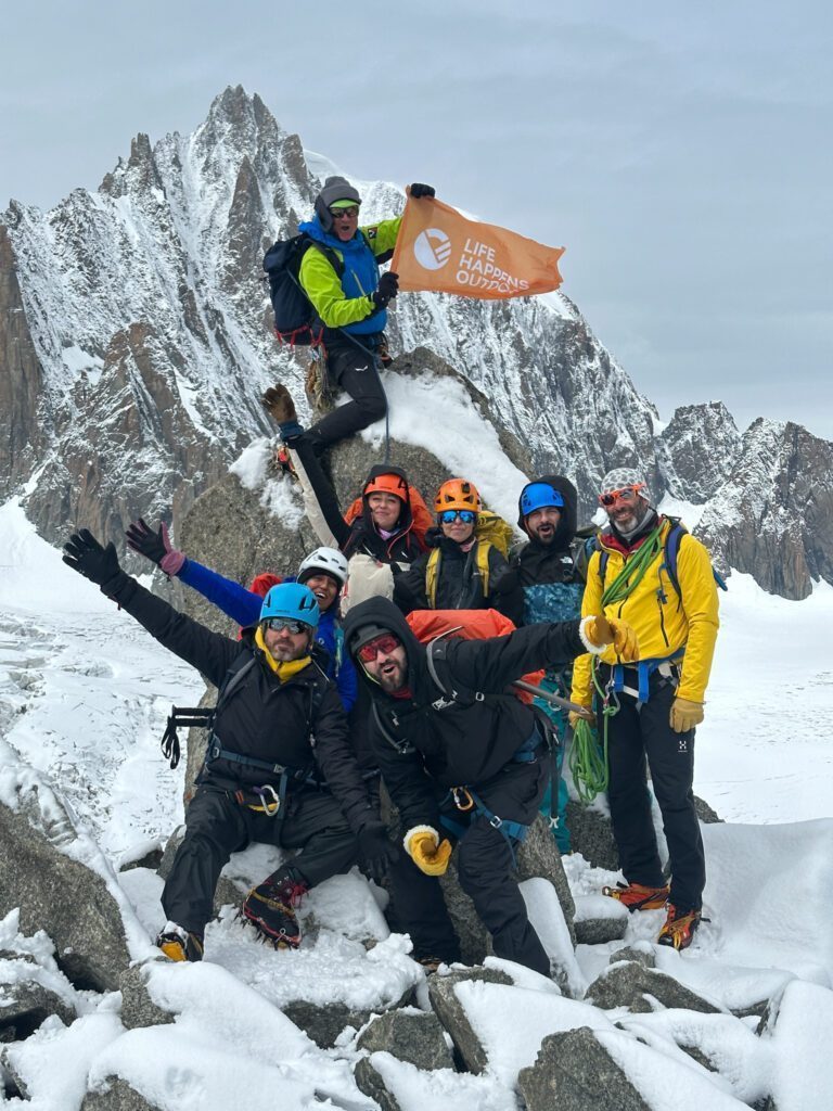 Jean Louis Moukarzel and Kareem Salhab on the summit of Petite Flambeau with the Life Happens Outdoors team, led by LHO guides Babis Marinidis and Philippe Genin, during the Mont Blanc Summit Climb course.