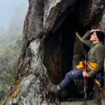 Nasser Al-Naama outside the cave that the trail passes inside of during the third and final day of the trek to the famous UNESCO World Heritage site, Machu Picchu, with the Life Happens Outdoors team.