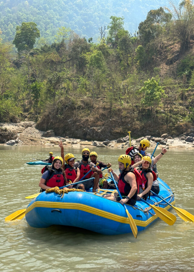 Rafting down the rapids of the river on the way to Bandipur during the Find Yourself in Nepal trip with the Life Happens Outdoors team.