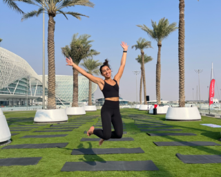 Yoga instructor Leen Madanat posing in the studio. She leads our Rock Climbing and Yoga retreat on the Greek island of Kalymnos with the Life Happens Outdoors team.