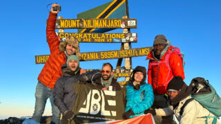 The ABLE.KSA team supporting the climb of Frederic Sfeir and Raneem Faraidy on Uhuru Peak of Kilimanjaro during the Climb Kilimanjaro expedition with the Life Happens Outdoors team.